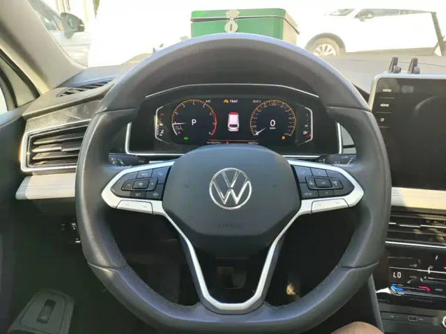 Volkswagen Tiguan L — Фото автомобиля 10