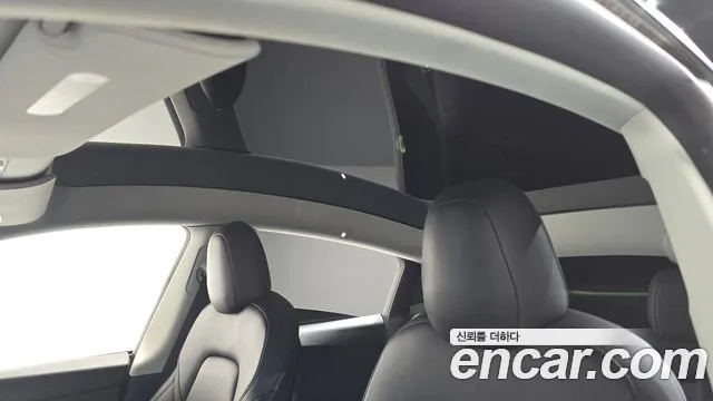 Tesla Model Y — Фото автомобиля 11