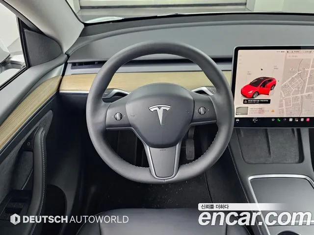 Tesla Model Y — Фото автомобиля 13