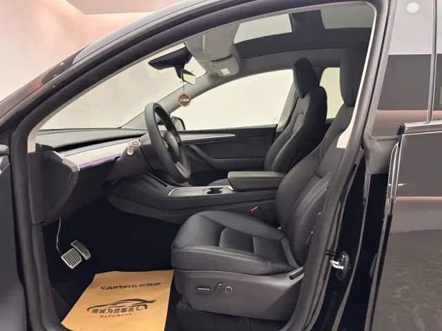 Tesla Model Y — Фото автомобиля 8