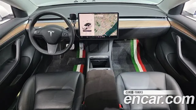 Tesla Model 3 — Фото автомобиля 10