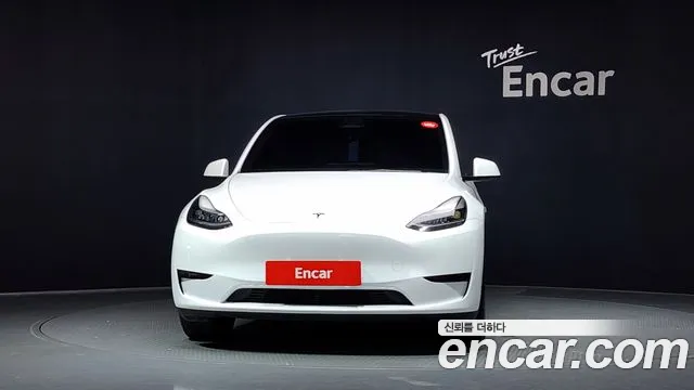 Tesla Model Y — Фото автомобиля 2