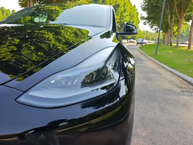 Tesla Model Y — Фото автомобиля 16