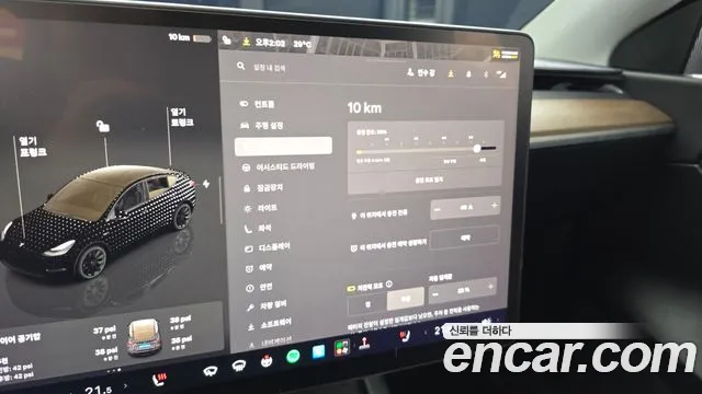 Tesla Model Y — Фото автомобиля 13