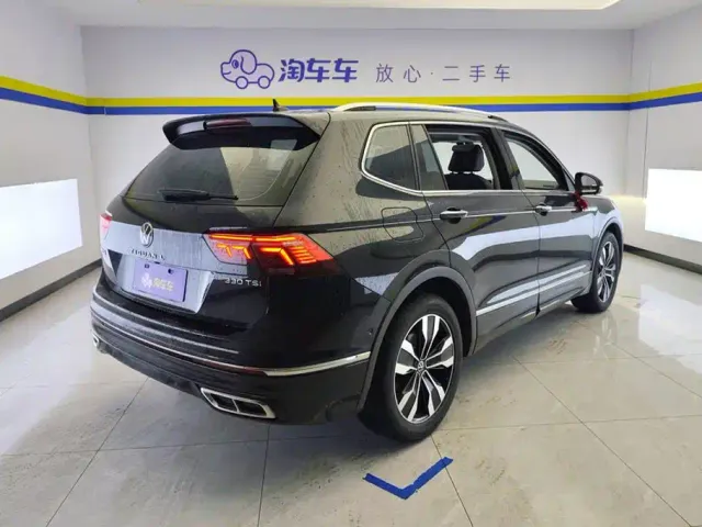 Volkswagen Tiguan L — Фото автомобиля 3