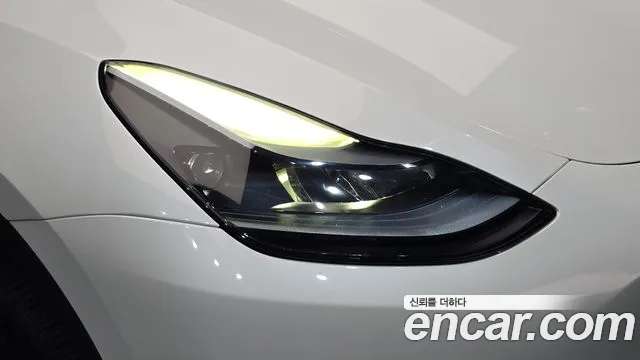 Tesla Model Y — Фото автомобиля 7