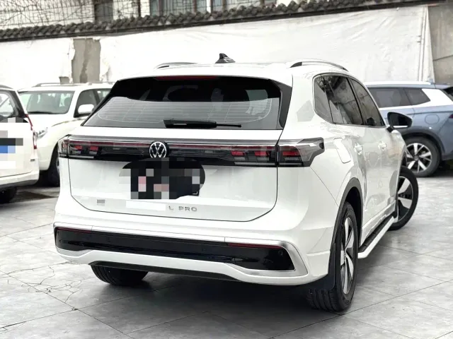 Volkswagen Tiguan L — Фото автомобиля 9