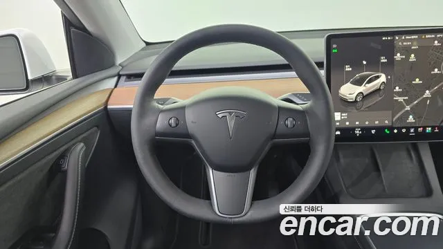 Tesla Model Y — Фото автомобиля 14