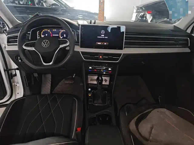 Volkswagen Tiguan L — Фото автомобиля 9