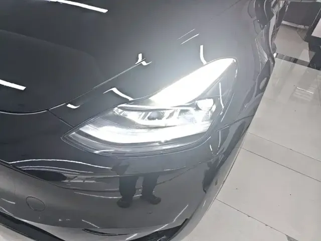Tesla Model Y — Фото автомобиля 23