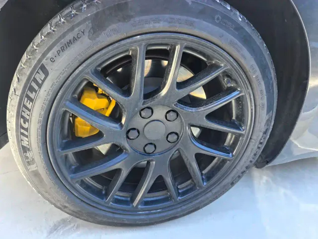 Tesla Model 3 — Фото автомобиля 12