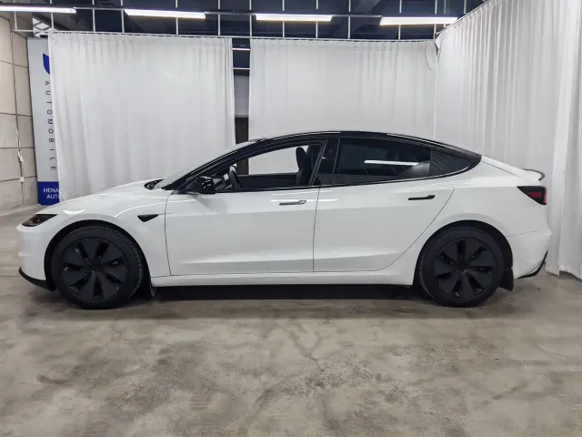 Tesla Model 3 — Фото автомобиля 7