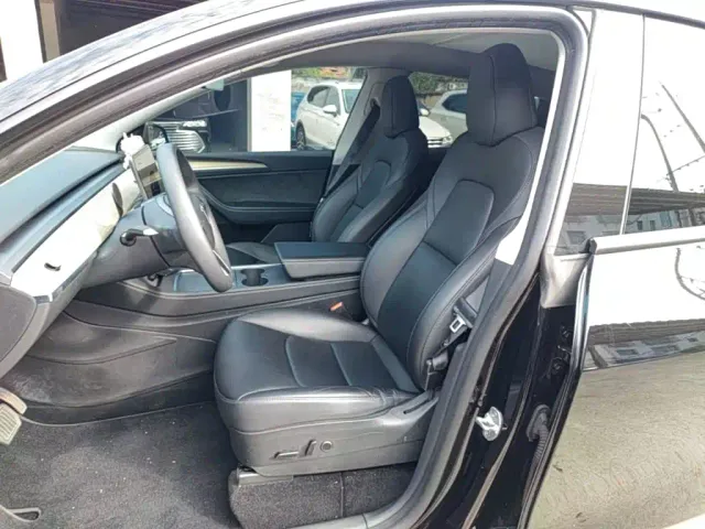 Tesla Model Y — Фото автомобиля 14