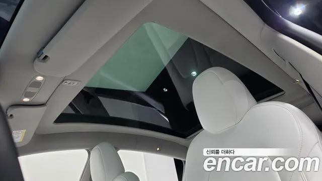 Tesla Model Y — Фото автомобиля 22