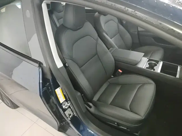 Tesla Model 3 — Фото автомобиля 24