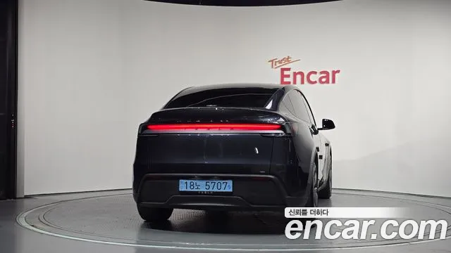 Tesla Model Y — Фото автомобиля 4