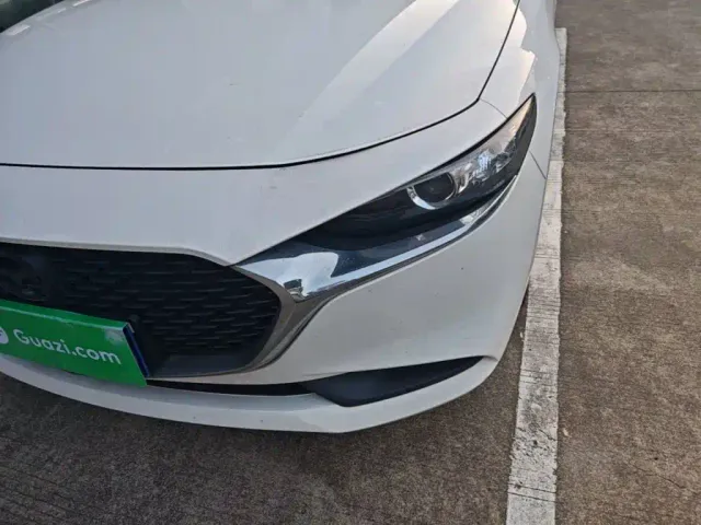 Mazda Axela — Фото автомобиля 23