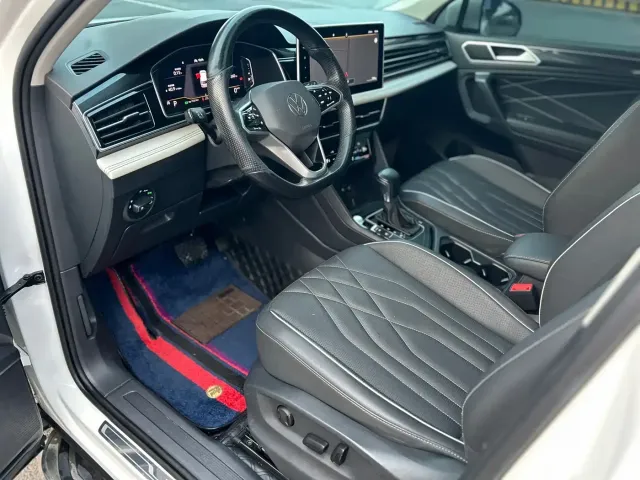 Volkswagen Tiguan L — Фото автомобиля 10
