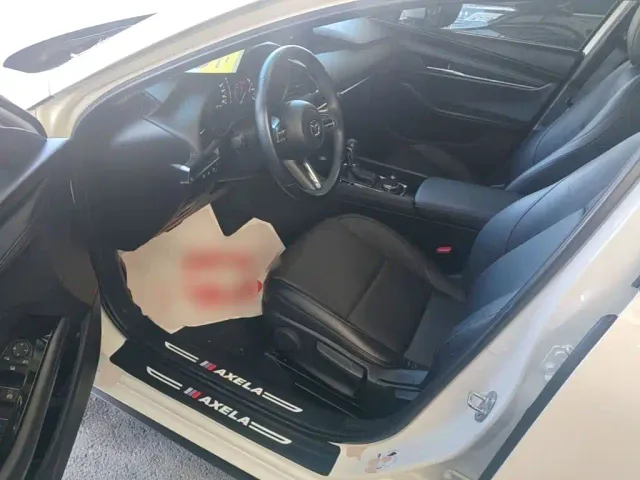 Mazda Axela — Фото автомобиля 15