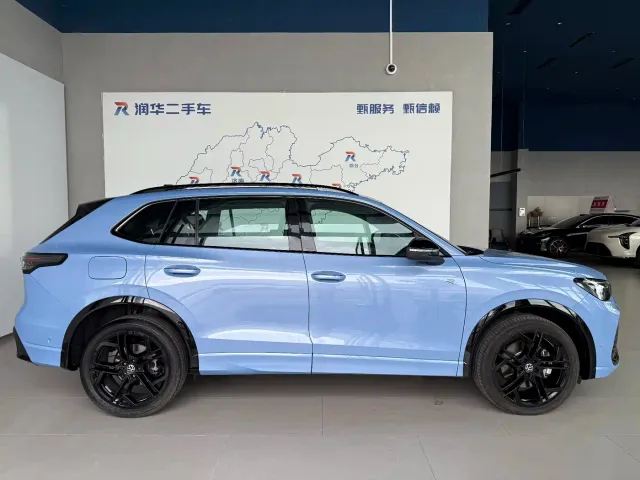 Volkswagen Tiguan L — Фото автомобиля 3