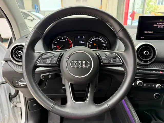 Audi Q2L — Фото автомобиля 11