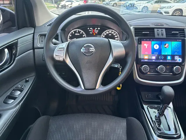 Nissan Tiida — Фото автомобиля 11