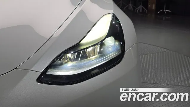 Tesla Model Y — Фото автомобиля 7