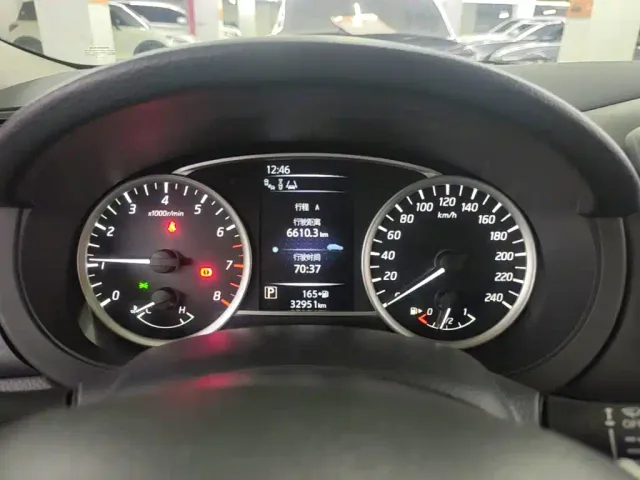 Nissan Tiida — Фото автомобиля 11