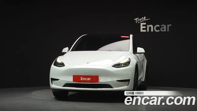 Tesla Model Y — Фото автомобиля 2