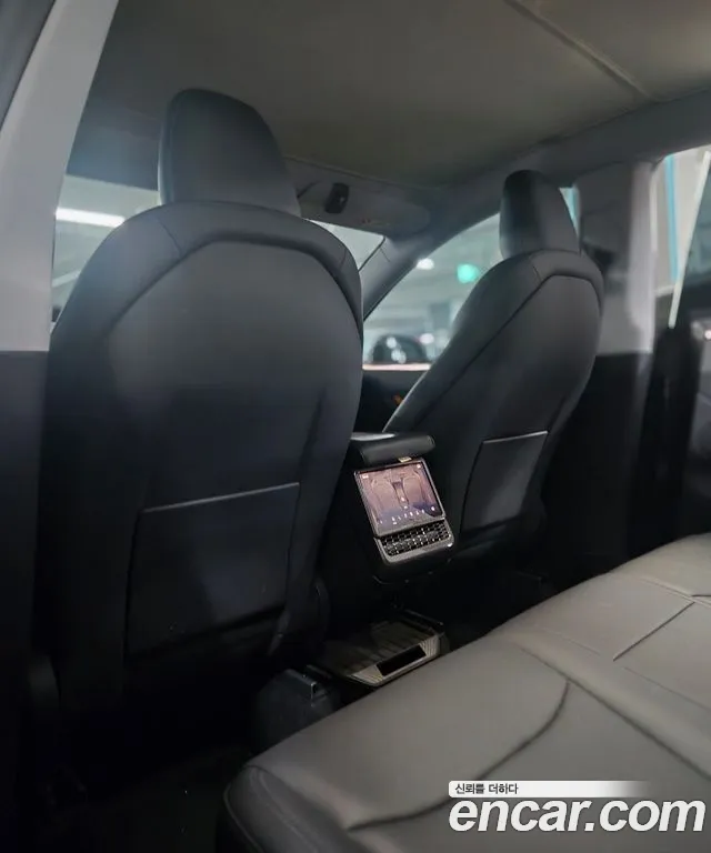 Tesla Model Y — Фото автомобиля 9