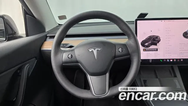 Tesla Model Y — Фото автомобиля 13