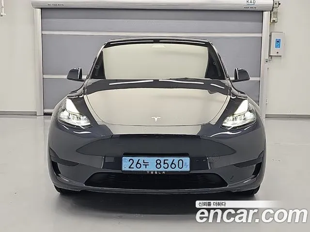 Tesla Model Y — Фото автомобиля 3