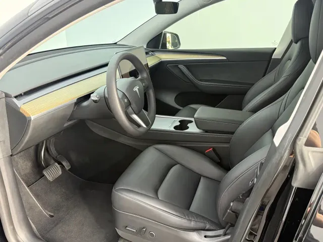 Tesla Model Y — Фото автомобиля 7