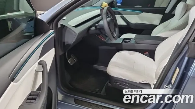 Tesla Model Y — Фото автомобиля 10
