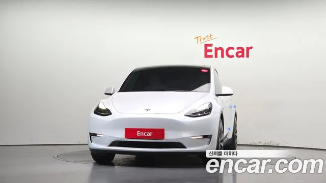 Tesla Model Y — Фото автомобиля 3