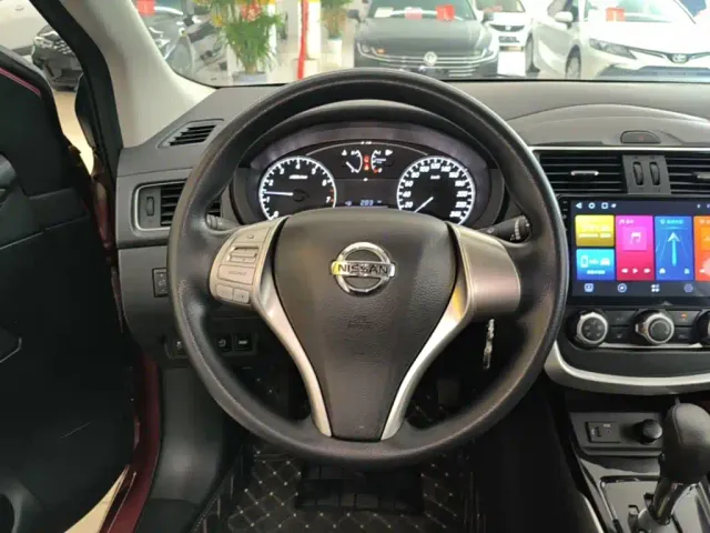 Nissan Tiida — Фото автомобиля 10