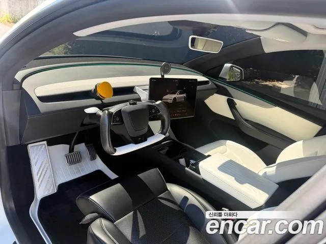Tesla Model Y — Фото автомобиля 7
