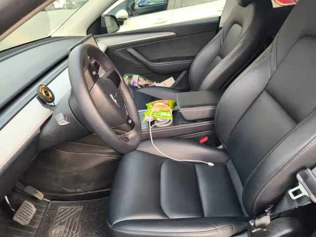 Tesla Model Y — Фото автомобиля 16