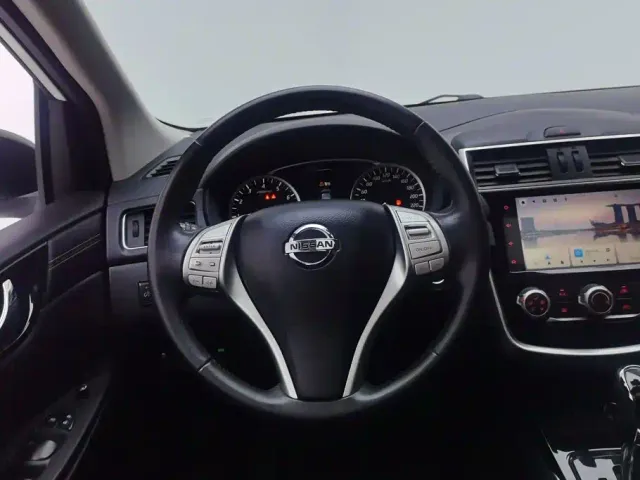 Nissan Tiida — Фото автомобиля 15