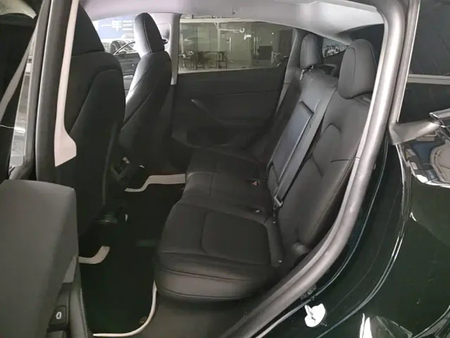 Tesla Model Y — Фото автомобиля 16