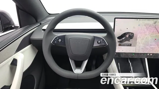 Tesla Model Y — Фото автомобиля 14