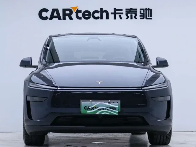 Tesla Model Y — Фото автомобиля 5