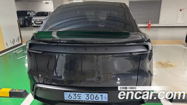 Tesla Model Y — Фото автомобиля 8
