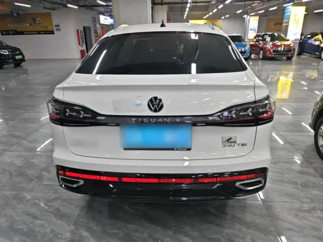 Volkswagen Tiguan X — Фото автомобиля 5