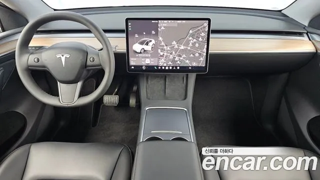 Tesla Model Y — Фото автомобиля 10