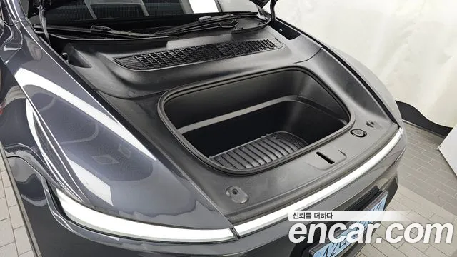 Tesla Model Y — Фото автомобиля 6