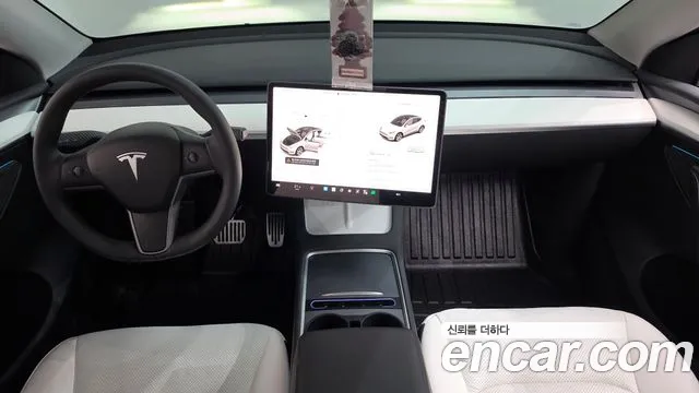 Tesla Model Y — Фото автомобиля 10