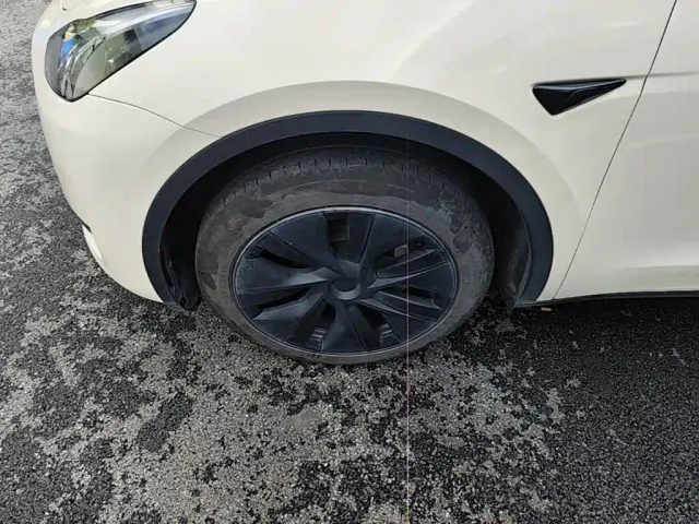 Tesla Model Y — Фото автомобиля 22