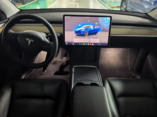 Tesla Model Y — Фото автомобиля 11