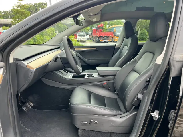Tesla Model Y — Фото автомобиля 5